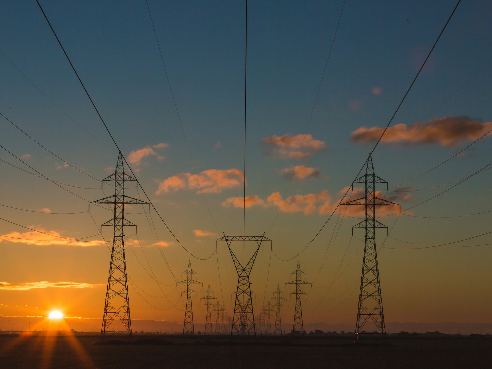 Transmission lines, refinery, or plant exterior at scale.